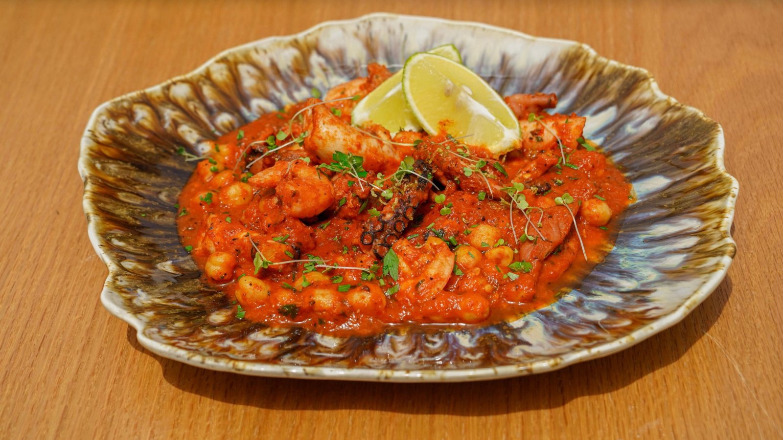 Creamy Shrimp Pasta: A Flower-Topped Plate at Noqta Space