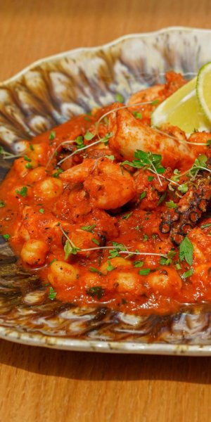 Creamy Shrimp Pasta: A Flower-Topped Plate at Noqta Space